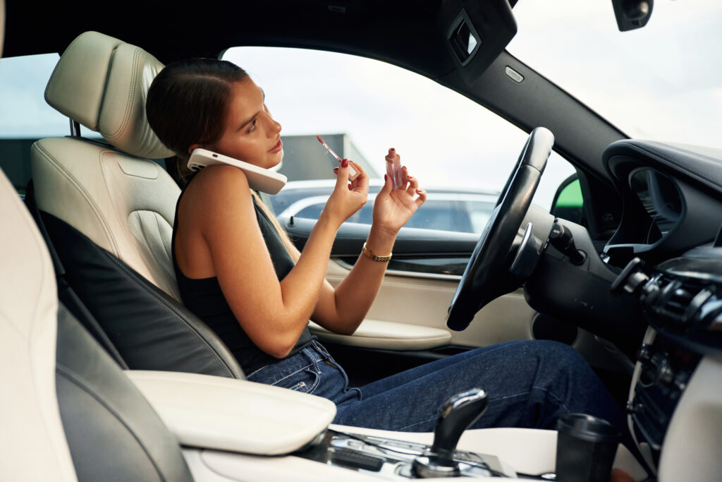 St. Louis Distracted Driving Lawyers. Driving on cell phone.
