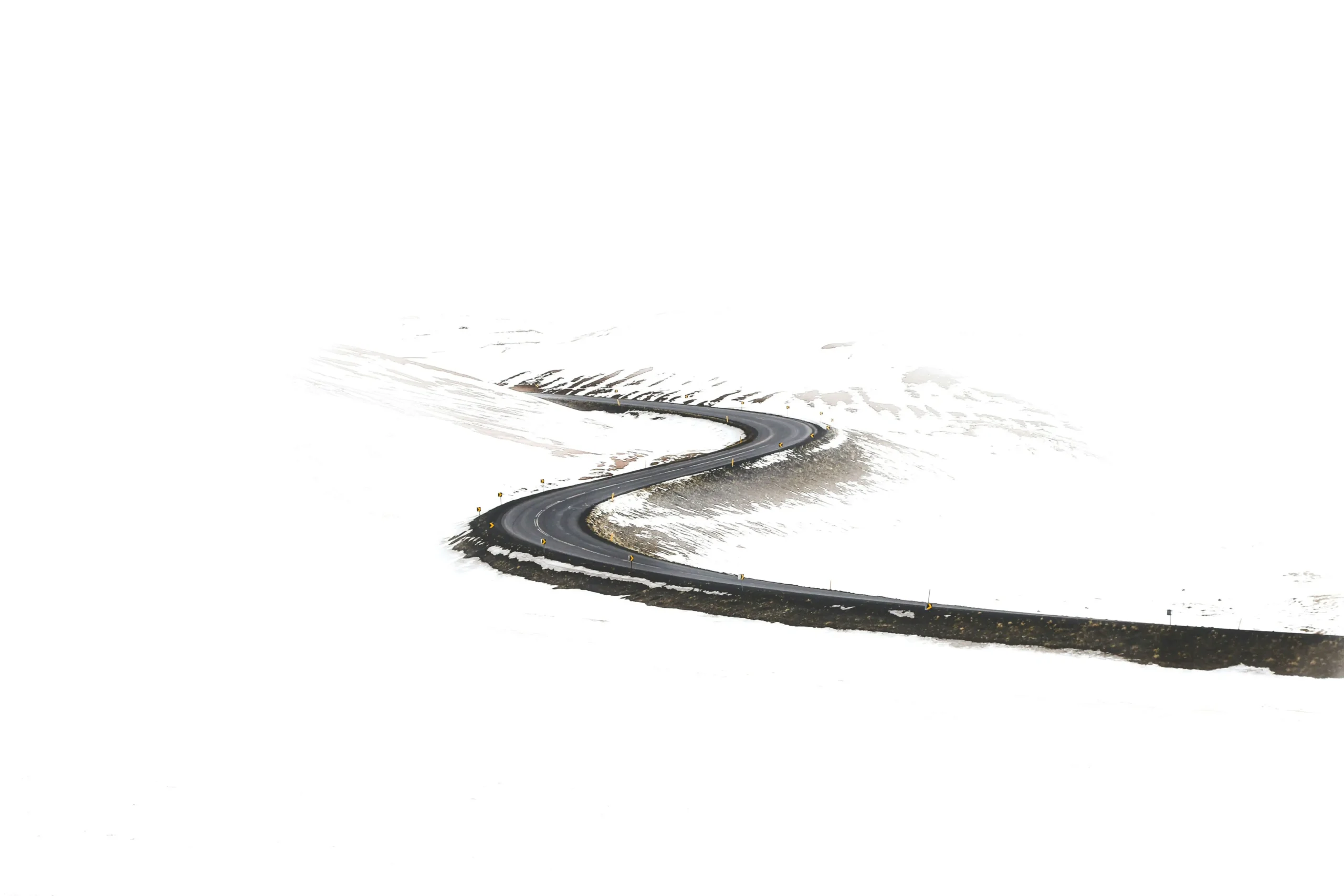 An old road covered in ice. Common causes of truck accidents.